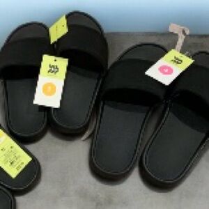 Buy one get one 50% off 
Cat & Jack Black Kids Slide Sandals